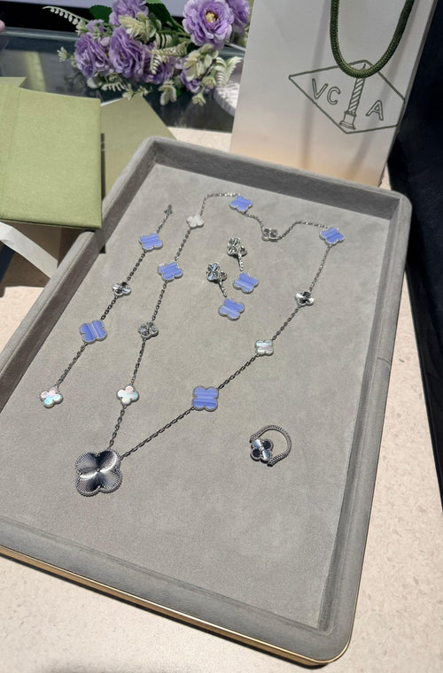 Van Cleef & Arpels Alhambra Jewelry Set (White Gold with Blue Agate, Mother-of-Pearl, and Guilloché)